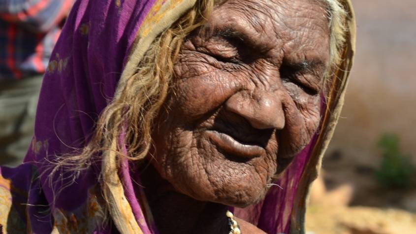 Elderly Indian woman in a sari, representing senior pensioners