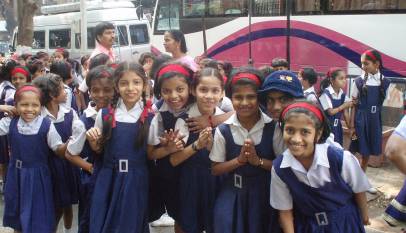 School girls in uniform walking together in Mumbai, representing students applying for NSP scholarships
